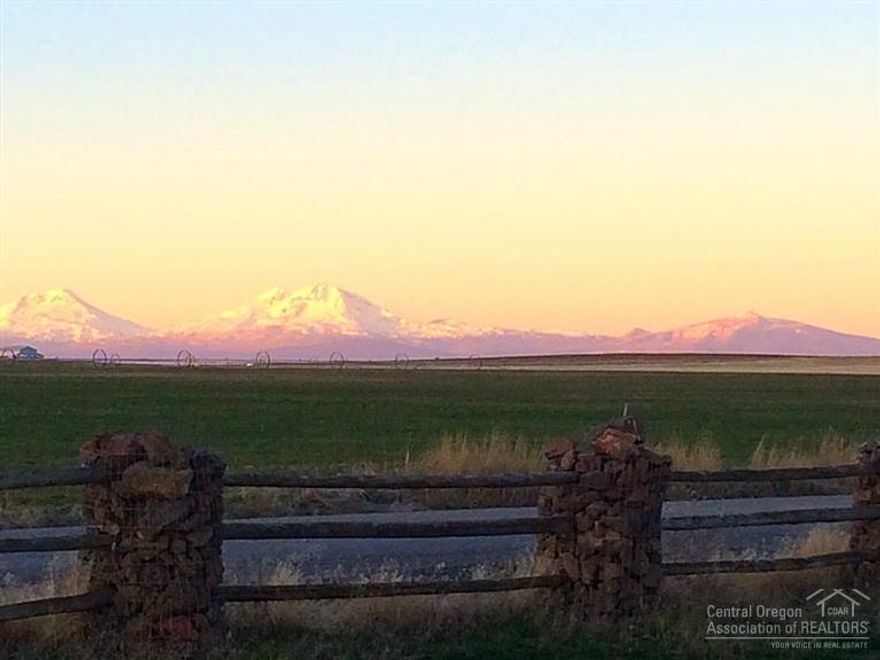 Beautiful irrigated view property with 39.70 acres to build your dream home on. There is currently an older manufactured home on the property. Property is set up for horses or cattle. There are 37 acres of irrigation. Improvements consist of a 24x30 shop, wired and with a concrete floor, a 12x18 4-stall horse barn with water to each stall and a 36x48 barn with stalls and tack room. There is a 140x270 roping arena with feed pen and water and power to the corral.