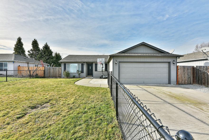 Come see this adorable 3 bedroom 2 bath home in White City! Located on nice street close to shopping with easy access the Highway 62. It features a beautiful kitchen that opens the dining and living room. New laminate wood floor and new paint throughout make this home cheery and bright. Bring your buyers and check out this lovely home.