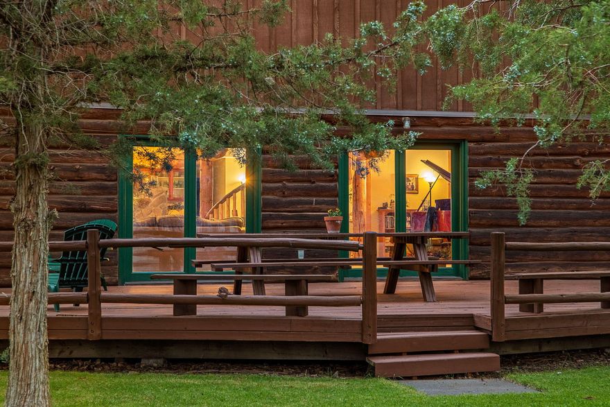 Welcome to your own secluded paradise, boasting the ultimate rustic charm and modern convenience. This stunning handcrafted log home offers a serene retreat from the hustle bustle of everyday life.
 As you step inside, you're greeted by the captivating sight of a log slab spiral staircase, artfully crafted around a majestic tree trunk, leading up to a mezzanine that overlooks the spacious grand room.  Perfect for entertaining or simply unwinding in the ambiance of natures embrace.
The heart of the home is the open kitchen, exudes warmth and functionality, featuring a cast iron stove that adds to the rustic charm of the log cabin ambiance. The main suite is  located on the ground floor, 
The four upstairs bedrooms have their own vanites. The outbuilding can accommodate a motor home and a car.  It also has an aprox. 1100 sq.ft. apt.  A greenhouse and chicken coop are a bonus. Recent upgrades include a new well pump and drain field extension.
New Wood Stove .  New Carport Roof