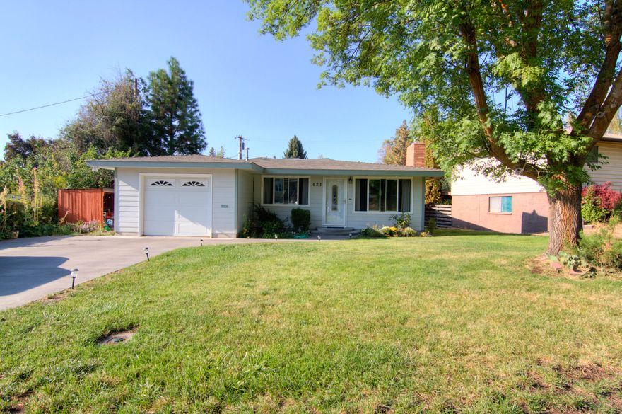 Fantastic home in a great location! Well cared for and maintained by the same owners for 20+ years. Large lot with fruit trees, green space out the back gate, mature landscaping, new siding, decking and paint.