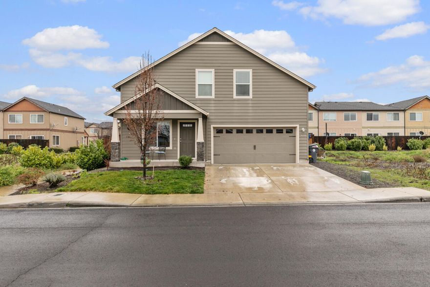 Charming 4 bed/ 2.5 bath home close to schools, shops, & parks. This newer 2018 build, 1904 sq ft home has plenty of space for the whole family. Walking in you are welcomed w/ a decently sized living room that transitions to the dining/ kitchen area. Large open kitchen features granite counters, pantry, stainless appliances, plenty of cabinet storage, breakfast bar & tile flooring. Plenty of natural lighting in the dining room from the sliding glass door to the low maintenance back patio/ yard area. Split floor plan boasting the primary suit downstairs w/ attached private bath, & dual closets. Upstairs you will find the remaining ample sized guest rooms one w/ a walk-in closet. Also upstairs is the guest bath w/ large vanity & tub/shower combo as well as the laundry area, & linen closet. Quant covered front patio, plenty of parking, & low maintenance front yard as well. This one won't last long! Call today!