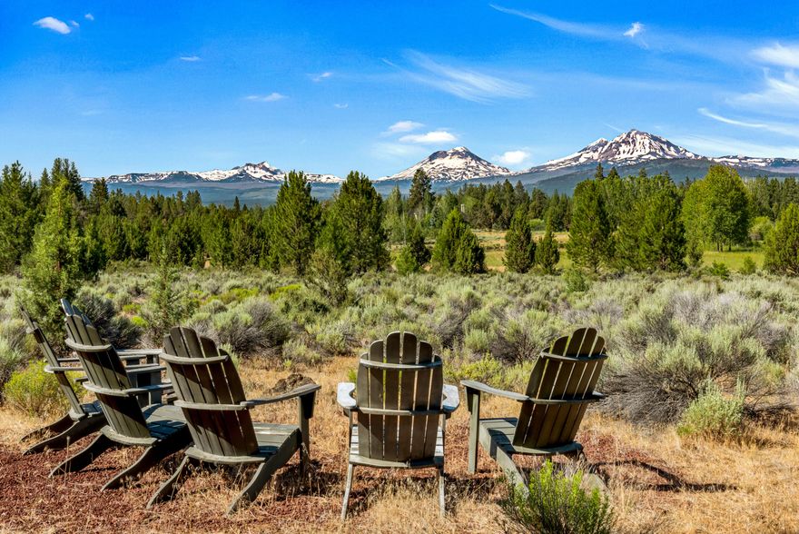 Build your legacy estate in Indian Ford Meadow, less than 2 miles from downtown Sisters. These two Mountain View parcels, totaling 25.86 acres, are zoned RR10 and are eligible for two custom homes plus an ADU. Adjacent to the 63-acre Indian Ford Meadow Preserve, the gated property offers exceptional privacy, panoramic Cascade views, and direct access to the Deschutes Land Trust's protected trails—ideal for cross-country skiing, hiking, and birding. Along with the sizable lined pond, enjoy 650+ feet of private frontage on either side of Indian Ford Creek which bisects the property. The land supports diverse habitats from wetlands and aspen groves to pine forests and serves as a migratory corridor for elk and deer and home to an abundance of songbirds. The land Includes 20.32 acres of water rights via the Whychus Creek Basin. This rare opportunity offers a stunning blend of natural beauty, wildlife, and proximity to Sisters and one of its most beloved nature preserves.