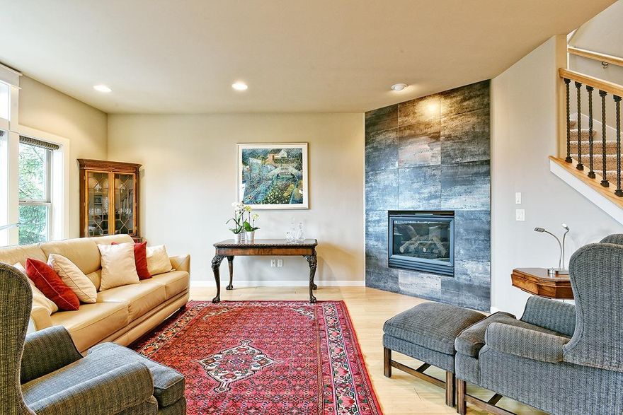 Beautiful, light-filled, single family home within walking distance to downtown Ashland. High ceilings throughout. Dual-zoned central heating and air conditioning. Open kitchen features Quartz Stone counters, stainless steel appliances, gas cooktop and electric oven. Walk-in pantry. Main floor has bamboo flooring, a gas fireplace in living room and French doors opening to a deck that enjoys mountain views. Large master bedroom has vaulted ceilings, walk-in closet and master bath with skylight, double vanity, soaking tub and separate tiled shower. A large second living area on lower lever has cozy gas fireplace, 2nd entrance with patio and low-maintenance fenced garden. 2-car garage with large storage closet.