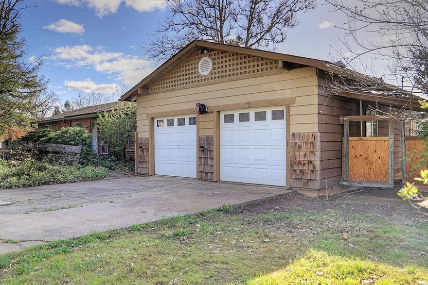 Single-Level Ranch-Style Fixer on 1.34 Acres of Level and Pretty Land in the Desirable Cloverlawn Drive Area. Home offers 3 Bedrooms, 2 Baths, and 1,288 Sq Ft. of Living Space. Open Living Area in the Kitchen, Dining, and Living Room Areas. Living Room offers a Fireplace with Woodstove Insert. Attached Oversized Garage/Shop, and Large Kitchen. This Home is in need of a substantial Cosmetic Re-do, but is well-laid out and has huge potential to be brought back to it's former glory. The Property is beautiful, offering Level and Useable Land, with tons of room for Animals, Kiddos, Gardens, and more. Lovely Mountain Views in every direction. Enjoy Rural Living, with the convenience of being located just a few minutes from Town. Financing options here are nil based on condition, so Cash or Private Financing only. TONS of Potential here, and priced to sell!