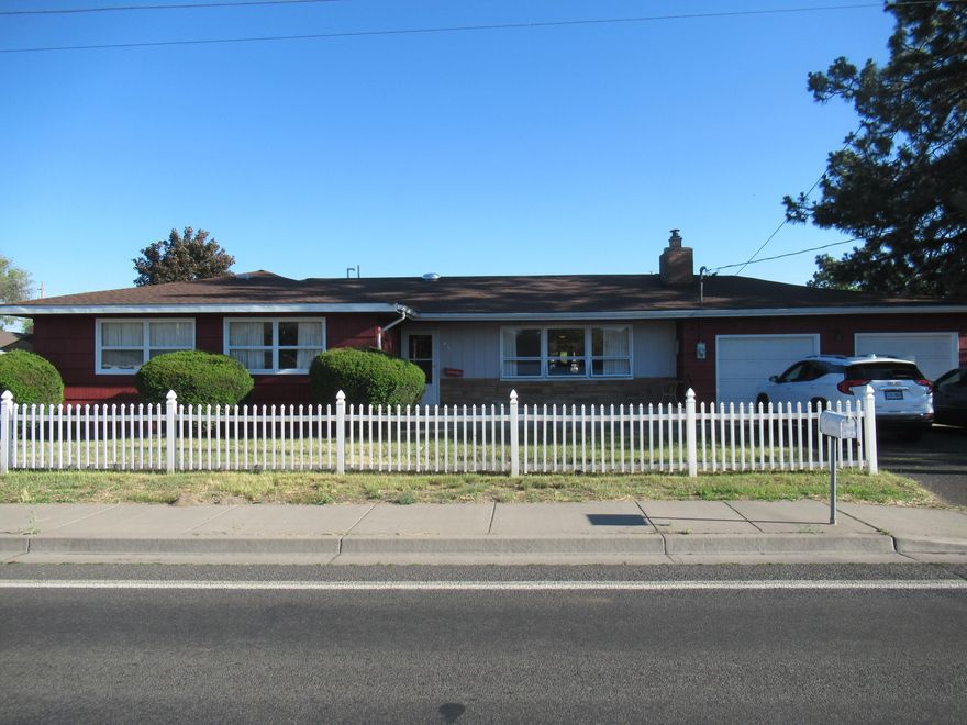 Charming traditional home ideally situated near Hilyard Park and Mazama High School. Lovingly cared for by one family across generations, this residence has been a cherished haven for enjoying the life in the beautiful Great Klamath Basin. 
Situated on over 1/2 an acre, you have room to expand and grow. A fenced backyard features a covered patio and a handy storage shed ideal for outdoor projects or extra gear. Bring all your toys as there is enough room to host them all. RV Parking. Need a place to grow a large garden? Look no further, as this property has the perfect spot with full sun for a veggie growing extravaganza or a lush flower bed or anything you desire. Recent updates include: new electric panel installed in 2025, & new exterior paint. Original hardwood flooring lies beneath the existing carpet, offering potential for a timeless, classic upgrade. Bring your vision and make this home sparkle with your design in mind. A whole home inspection has been completed.