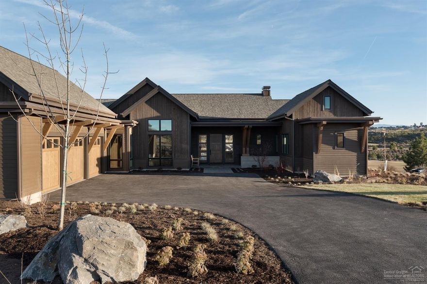 New, NW contemporary single level home in Tartan Druim. Open 3,480 sf floor plan w/vaulted ceilings, 3 bedrooms, 3.5 baths, study, 3 car garage & spectacular golf course views. Luxuriously finished w/solid surfaces, woods, custom cabinetry & high end appliances. Set in Tetherow & bordering the Deschutes National Forest, Tartan Druim offers direct access to Phil's Trail & is conveniently located on Bend's West side. The neighborhood park, Tartan Place, features 3 acres of grass, bocce ball courts, firepit, and more.