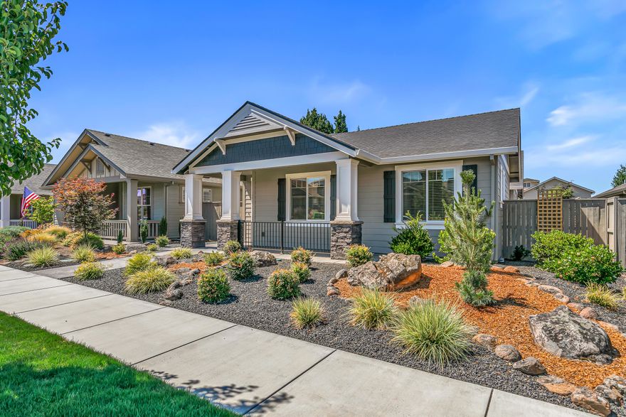 This custom Summerfield Cottage combines timeless charm with modern comfort. An open floor plan with wide-plank hardwood floors, shiplap ceilings, and a stone fireplace creates a warm, inviting atmosphere. The kitchen shines with quartz counters, farmhouse sink, subway tile backsplash, and upgraded appliances—perfect for everyday living or entertaining. The generous primary suite is a private retreat with dual vanity, large walk-in shower, and spacious closet. Enjoy seamless indoor-outdoor living with level access, a courtyard patio, and refreshed landscaping. Recent updates include beams in the great room, accent interior paint, and custom lighting. Thoughtful extras and close-in amenities with low-maintenance design leaves more time to simply enjoy home.