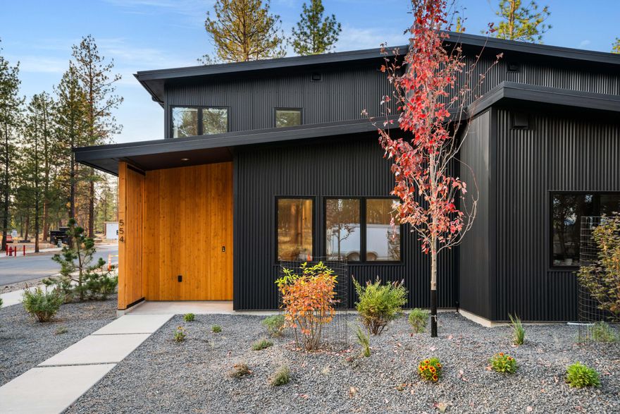 Sisters Woodlands Sunstone Townhome has a two floor layout with primary suite and two bedrooms (or 1 bedroom/1 family room) downstairs. Main living, including a huge covered deck upstairs. Homes are carefully sited to save 100's of pine trees & complement natural environment. High quality design & build is sustainable, durable & efficient for turnkey/very low maintenance dwellings. Enjoy all Sister's Area offers with easy walkability from this mixed use community to downtown & wilderness. Interior features: Hardwood/tile floors & quartz counters throughout; Stainless energy star appliances; Ductless/zonal HVAC. Exterior features: Metal siding (fire/pest resistant); Generous attic storage areas. Option for large outdoor patio and additional landscape on ground level; Solar & EV charger ready. 2-10 year Homebuyer Warranty included. Visit model home at 515 N Pine Street.