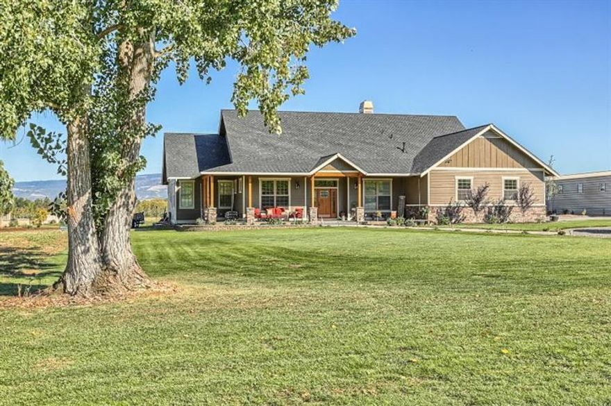 This is it-the Oregon Dream! Beautiful home, custom built in 2013 on 2.34ac. w/irr. rights,& only 1.4 miles from historic Jacksonville. This stunning Craftsman-Style home, w/a Northwest flair, offers an open & inviting floor plan w/10'ceilings. Home is beautifully appointed throughout w/soaring 18' ceiling in the great room & a floor to ceiling gas fireplace,a fabulous island kitchen w/gas range, dbl ovens, beautiful cabinetry & two dishwashers. There are 4 spacious bedrooms, bonus room/den,& 2 1/2 baths,including a private master suite w/2 walk in closets , beautiful detailed ceiling & large bath w/soaking tub & large tile shower w/two heads. Home offers an oversized 3 car garage plus a totally finished 2900 sq.ft. detached shop w/natural GAS heat, half bath & two 12 ft. high doors. Above, there is a 1200 sq. ft. 1-bedroom guest quarters w/full bath, living room & office. This is a lovely rural setting, conveniently located & in the desirable Jacksonville School District.