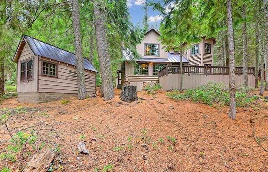 Absolutely the most charming West Side Lakefront Cabin at Lake of the Woods! Experience the enchantment of the Cascade Mountains of Southern Oregon!  This cabin has been lovingly maintained and improved over the years and features a very comfortable floor plan with a large exposed beam living room with a newer Vermont Castings wood stove, open style kitchen and dining area with new flooring, appliances, and quartz countertops. The bath has been recently updated. One bedroom on the main floor and additional 2 bedrooms are upstairs. Large deck offering great views of the lake and a wonderful newer private dock.  Year-round recreation: swimming, fishing, boating, water skiing, jet skiing, hiking (Pacific Crest trailhead nearby), snow shoeing, snowmobiling (over 300 miles of groomed trails) & cross-country skiing. Resort area offers dining facilities, general store, marina and live weekend entertainment in the summer months. Furnishings are included, turn-key cabin ready to enjoy!