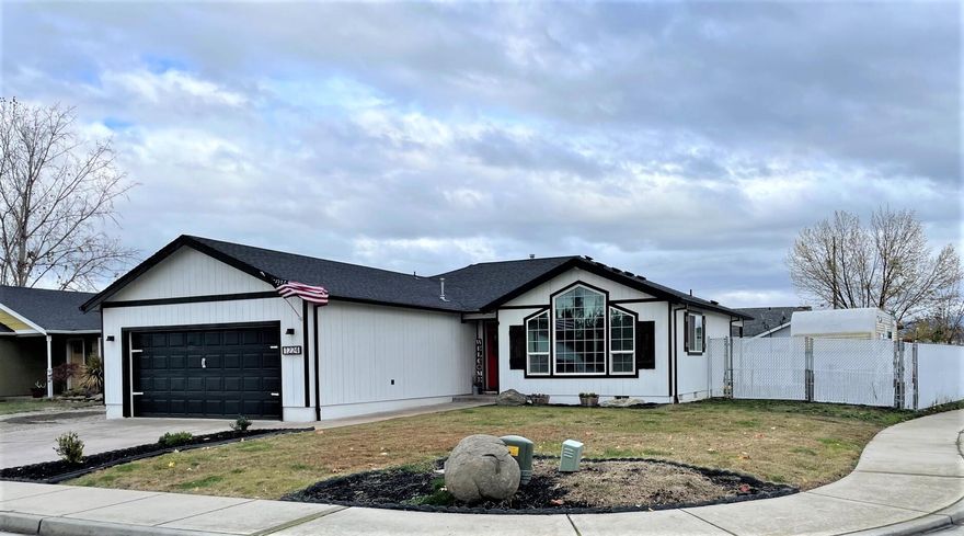 Do you want a beautiful home with a good size backyard and RV storage conveniently located in Central Point? If so, this home is for you. This 3 bedroom 2 bath 1316 sq foot home was built in 2001 on a corner lot. Fresh paint throughout.  The living room features a vaulted ceiling and a ceiling fan. Large primary suite with tray ceiling, ceiling fan and updated private bath.