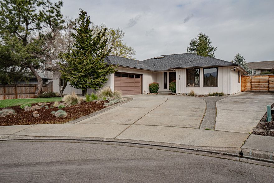 This charming single-level home is nestled in a peaceful cul-de-sac within the desirable Lone Pine School District. Boasting an inviting open floor plan, the residence has natural light, which accentuates its vaulted ceilings and updated features. A focal point of the living space is a cozy brick fireplace, complemented by built-in bookshelves. The home is adorned with tasteful updates, including modern colors and fixtures. Outside, the low-maintenance yard is a serene retreat, complete with a tranquil fish pond and waterfall. Conveniently, there is ample space for an RV or boat, with easy access.