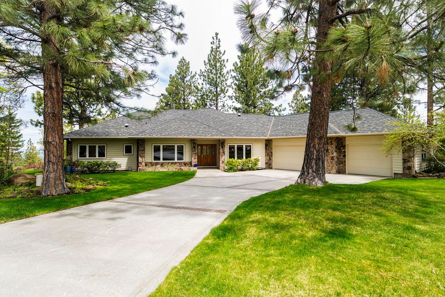 Luxury single-level home in a private treed Awbrey Butte location with stunning postcard- perfect Cascade mountain views. New tile welcomes you at the entry. Premium finishes include 6'' base, 4'' crown molding, new hardwood floors, all new custom-built kitchen w/Thermador appliances including convection & steam ovens, induction cooktop, pot-filler, glass door cabinets w/lights & hidden drawers. Light-filled windows are at every turn. The separate primary suite includes a tiled shower, jetted tub, and dual sinks. 
Restore and relax on your paver deck overlooking gorgeous landscaping Mt. Hood & Mt. Washington views! Ample storage & parking in the 3-car garage on this roomy .67-acre property. Truly a remarkable find!