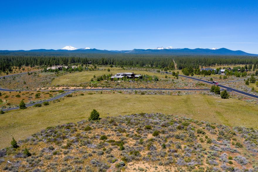 In the premier Highlands at Broken Top neighborhood, this ten acre parcel with Cascade Mountain views is surrounded by large meadow area and offers the perfect setting to build your custom home. Peace and privacy with a gated entry and close to everything on Bend's West side including world class mountain biking and hiking trails, minutes to Mt Bachelor skiing, and great golf nearby. Protective CC&Rs and Design Guidelines allow creative home design options.