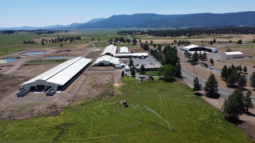 The Solid Rock Dairy has been in operation for over 50 years, located 30 minutes East of Klamath Falls, This turn-key operation, ready to go into service again has capabilities of 750 cows milking 3 times a day.  Sitting on over 418 acres with 320 under irrigation through the Langell Valley district, along with a well that has a suplimental permit for the drought years. Flood irrigated and reel sprinklers. There are numerous outbuildings including 3 feeding/loafing barns, 1 springer barn, all with flush tanks, commodity shed, large double 12 Milking barn and parlor equipment, large hay barn with a 1000 ton capacity, large shop for equipment repairs, corrals, adequate lagoon system,. The operation also includes all irrigation equipment, with all dairy and farm equipment plus an ultra important CAFO (Confined Animal Feeding Operation) for 1720 head permit. All under a 150 KW generator for bakup. The main house is a 3/2 2392 sq ft. a second home and bunk house. Call for a tour today