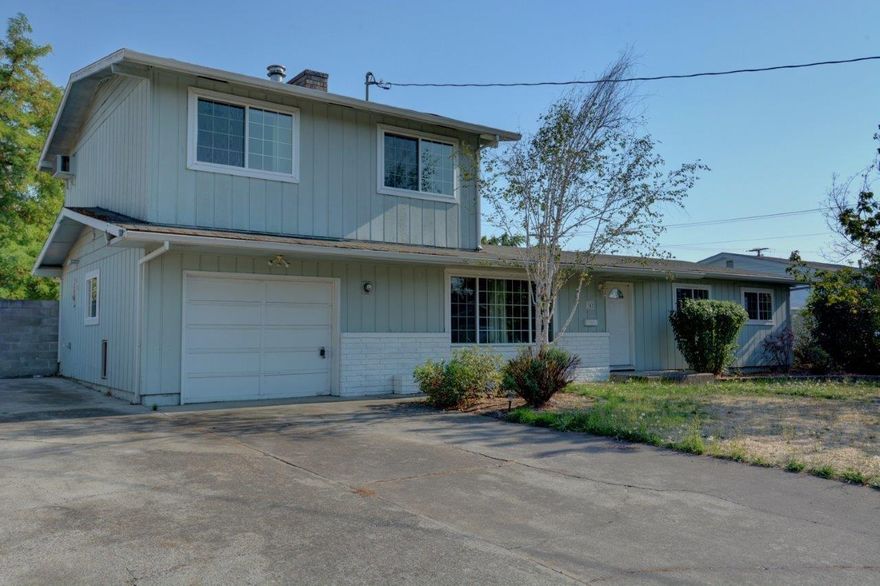 Great opportunity to own over 1800 square feet at a huge discount! This 3 bedroom home has incredible potential and offers a very functional floor plan with an upstairs bonus room or possible master conversion which already has a walk-in closet or potential additional bathroom. Great usable backyard with built in grill, hot tub, swimming pool and yard. RV parking in addition to the garage. Although livable, the home will likely need a conventional loan or a rehab loan that incorporates some upgrades and repairs into the loan. This could be a great flip opportunity, or live in it and make the upgrades yourself. Vacant with lock box, no appointment necessary. Go and look!