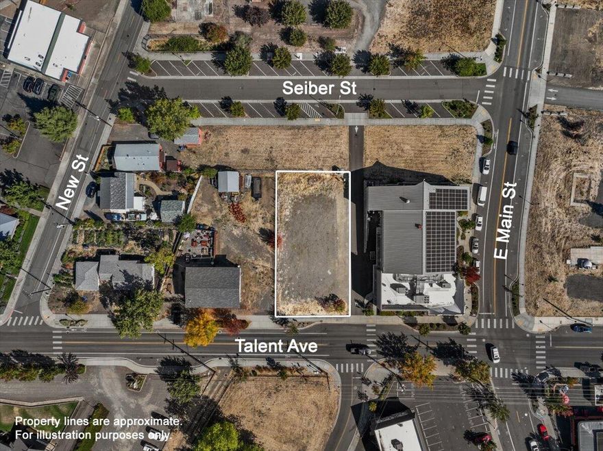 Prime, level lot located in the heart of downtown Talent, offering an ideal opportunity for development. Situated next to the Camelot Theater and just a short walk from the new parking lot, this property is zoned CBD (Central Business District), allowing for a variety of mixed-use options, including residential units on the second floor. It boasts street frontage along Talent Ave, with alley access on one side. Previously, the property had a full set of plans and engineering approved by the City of Talent Planning Department in 2019. All utilities are available at the property line. This is a fantastic chance to be part of Talent's dynamic growth and development. Attached are the zoning documents from the city. Buyer to perform their own due diligence.