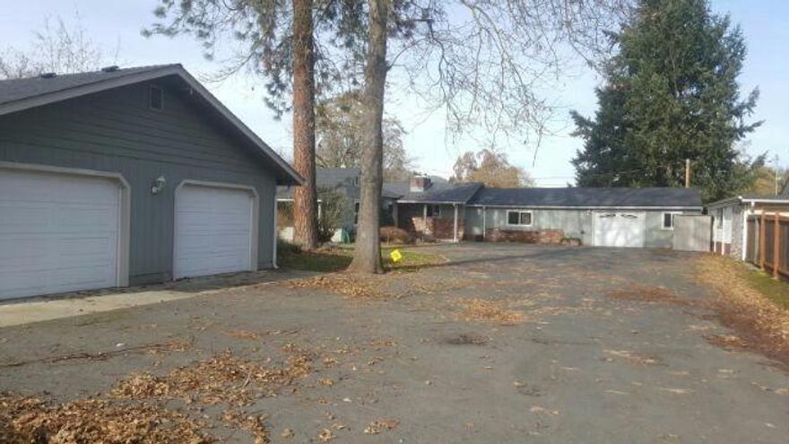 Stunning details abound in this 4 bedroom, 2-1/2 bathroom, 2144 square foot riverfront home in Grants Pass. While the interior features include brick fireplace, lots of space and built-ins, outside the house gets even better where the massive deck wraps around the entire back half of the house and overlooks the scenic Rogue River and huge yard. There is even a detached garage and horseshoe pits in the yard.