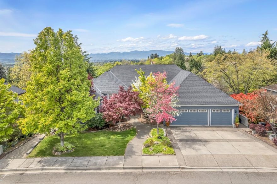 Impeccable quality and detail in this East Medford stunner! Elegance & luxury are yours in this 5 bed, 4.5 bath home, w/ a dramatic foyer, office space, formal & informal dining, exquisite main level primary suite; spa like ensuite w/ custom tile work, soaking tub, dual sinks & water closet. Your sprawling chef's kitchen is equipped w/ granite, custom cabinetry, high-end SS appliances, dual convection ovens, massive island, separate beverage area, 2 dishwashers, built-in desk.  Your laundry rm features marble and leads to a 3 car garage w/ workbench.  Family, & living rms feature gas fireplaces, crown molding,  soaring ceilings & hardwood flooring. The daylight basement w/ separate entry offers a bar/kitchen,  fridge, microwave, dishwasher, family rm, 2 bed, 2 bath, additional laundry,  home gym or multipurpose rm, storage gallor. Entertainer's dream home or multifamily set-up! Seller offers a up to 10k interest rate buy down.