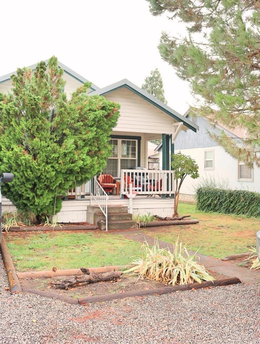 This beautiful cottage home is conveniently located close to shopping and recreation. Nestled in a quiet neighborhood this property offers multiple opportunities. The investor looking for a property zoned R-4, or the first time family looking for a safe neighborhood. This older home has experienced a few upgrades over the years; enclosed back porch, electrical updated in 2007, and new heat pump in 2007. The carpet hides hardwood floors that could be brought back to their original splendor. An over-sized covered RV parking area has full hook-up, including cable. Metal cover is 14x44 to protect your RV. The inside of the house has ample storage, but if you have someone with a lot of toys or that likes to tinker, there are 3 storage units with reinforced flooring.