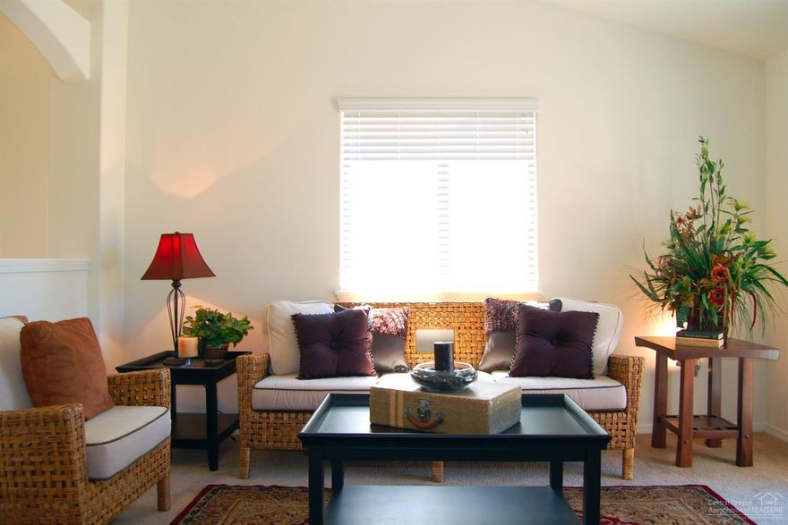 This 1,235 home lives large with Vaulted ceilings that span the dining room as well as the spacious living room.The kitchen provides ample counter space and cupboard storage is uniquely positioned in the front of the home. The master suite is expansive, features two spacious closets and an ensuite with dual vanity. Sharing the second bathroom, the other two bedrooms are sizable, one providing an oversized closet while the other was converted into an optional den. Come and enjoy the common are spaces and the walking paths that this beautiful community has to offer!