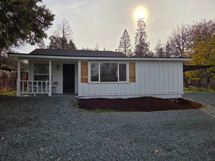 This large .34 acre property on the perimeter of Grants Pass is fully fenced. The house has been recently remodeled with an all new kitchen, bathroom, flooring, paint, plumbing roof and fixtures. This 2 bedroom, one bathroom cottage is move in ready. Laundry room and additional storage or office room. Private well and septic for low utility bills.