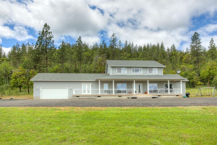 Beautifully maintained home w/ 14 acres of meadow bordering Synder Creek. Three bedrooms, two baths upstairs. Downstairs features a large living room w/ built in surround sound & tv, large bonus room w/ pool table, formal dining room, bfast nook, half bath, and additional office/den. Multiple french doors, hardwood flooring, berber carpet, storage space & more! Design your own back patio, hardscaping & large fireplace make this a fun diy design project. Beautiful meadows w/ plenty of deer, and wild turkey. Tons of space for barns, arena, shop or green houses. A truly remarkable piece of property!