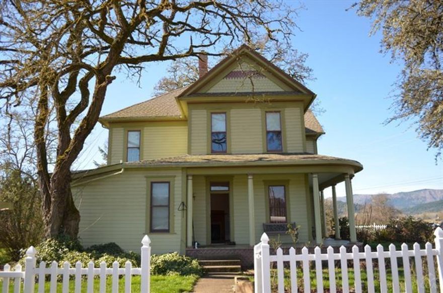 This grand old 1890 Victorian is one of a very few historic treasures that has stood through the test of time. From a bygone era all but lost, few of these old charmers have survived. Lovingly restored and updated in just the right places - no casual glances here! This home is remarkable! Almost 3 acres of lush pasture with irrigation and a massive old barn, complete with a horseback riding arena, really complement this amazing home. Come and bring your love to this well-deserving antique of the 1800's.