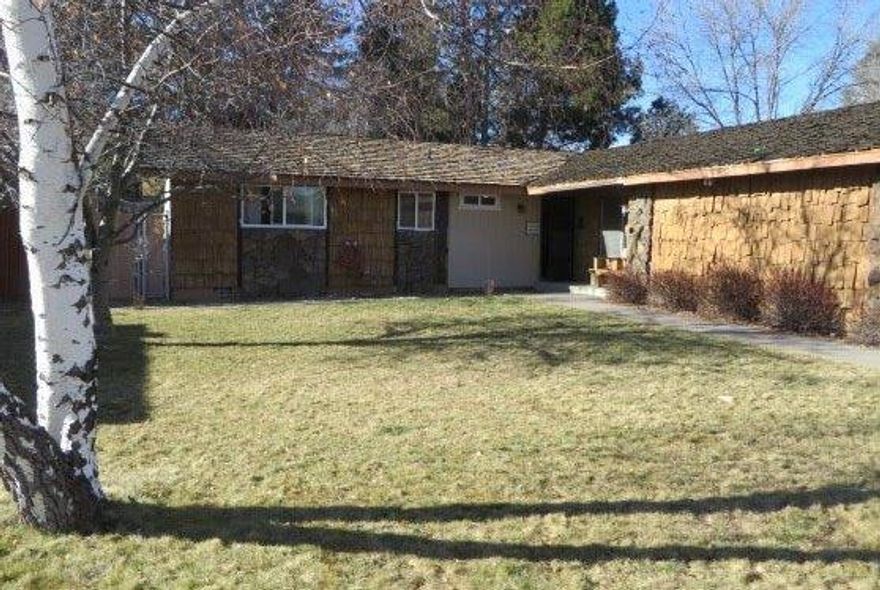 Great family home in Sunset Village! 3BR, 2B, family room, living room, open kitchen-living room-dining room with 1508 sq feet, Large 2 car attached garage,home has some new vinyl windows, new sliding door onto covered patio. Fenced back yard and sprinklers in both front and back.