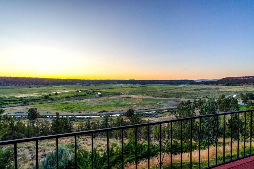 **One-of-a-Kind Retreat!** Nestled on 10 acres with stunning views of the Crooked River Valley, this private 3,549 sqft home is a true sanctuary. Enjoy the grandeur of cathedral ceilings and a cozy rock fireplace in the inviting living area. The beautiful kitchen features granite countertops, perfect for culinary enthusiasts. With 4 bedrooms and 3 bathrooms, plus the potential for a 5th bedroom, this home accommodates families and guests effortlessly. The full walkout basement offers additional living space, while the spacious deck invites you to bask in breathtaking views. A dream 40x75 steel shop, built in 2023, fully insulated, 20' eves, and ADU ready, enhances the property's appeal for hobbyists or those needing extra storage. Located just minutes from local amenities and outdoor adventures, this property combines tranquility with convenience. Don't miss your chance to own this extraordinary slice of paradise!