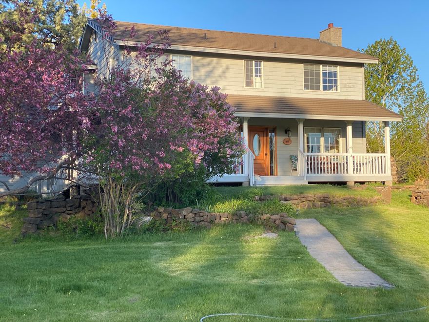 Gorgeous Tumalo acreage with incredible mountain views. Location, location, location, this fabulous country acreage is just minutes to all of the Bend amenities. Custom built, one owner home overlooks a beautiful pasture and has full Cascade mountain views. Picturesque irrigation stream runs alongside the length of the property. Spacious kitchen with eating area and bar with new quartz countertops and stainless steel appliances. Light and bright dining area and living room with wood burning stove and incredible views. Main floor family room is comfortable and cozy. Large master suite plus 2 spacious bedrooms upstairs. Lovely remodeled bathrooms on both levels. Large flex room would be a great play room, hobby room, office or 4th bedroom. Large hay barn could also make great toy storage. With 4 acres of Swalley irrigation and fully fenced acreage, this property is perfect or all your animals.