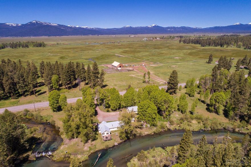 Lifetime opportunity to own this historic Fort Klamath Ranch, in the heart of reputation cattle country! At the site of the old Fort, the Double K is rich in history and beauty! Lush, flood irrigated meadow pastures, wetlands, aspens, ponderosa pines! Working corrals, scales, shipping pens, historic barn. Ranch house on Fort Creek with .32 +/- mi. frontage, plus 1.39 +/- frontage on the famous Wood River trout fishery! Just minutes to Crater Lake National Park! Awesome views of Oregon's Cascade Range!