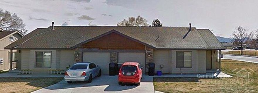 Great Opportunity in SW Redmond, a duplex on almost a 1/4 Acre. Single-story duplex with great rental history. Property Features: premiere location near Umatilla Sports Complex, 2bed 2bath in each unit, great room floor plan w/ vaulted ceilings, gas fireplace, laundry area, island breakfast bar in kitchen, backyard patio, and a single car garage. Worth a look.