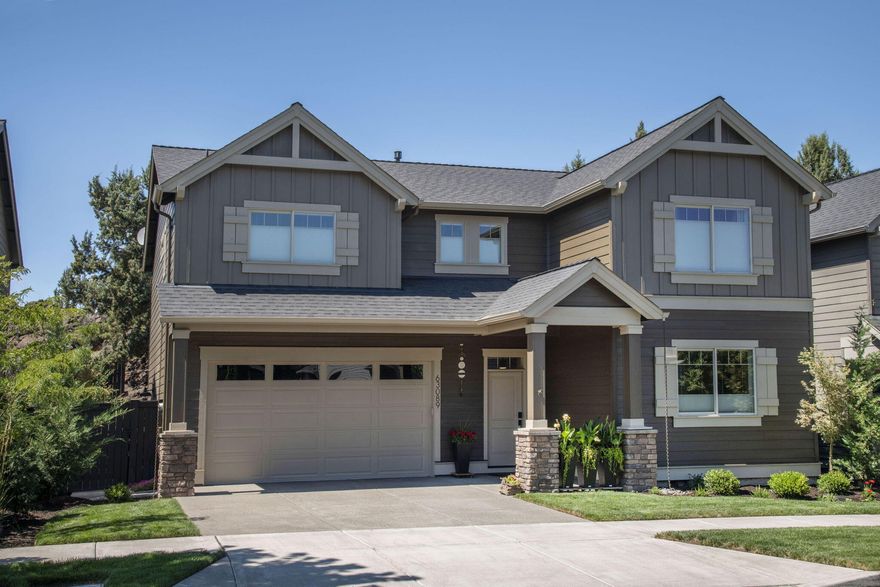 Discover your dream home with an assumable 2.99% loan! This stunning Pahlisch home in Lava Ridges offers the best of comfort and style with the popular Chloe floor plan. Featuring spacious, open main-level living, quartz counters, stainless appliances, laminate floors, and a cozy stone fireplace. Recent upgrades include new lighting, hardware, sinks, and fresh paint inside and out (see attached list). The large primary suite boasts a coffered ceiling, walk-in closet, tiled shower, and double vanity. Additional space includes a versatile bonus room or 4th bedroom with a walk-in closet. The beautifully landscaped backyard with lava rock walls, a patio, and hot tub is perfect for entertaining. Extras like built-ins, A/C, and a two-car garage with extra shop space make this home stand out. HOA covers front yard maintenance and access to the community pool. Located near top schools, Pine Nursery Park, hospital, and shopping—this home truly has it all!