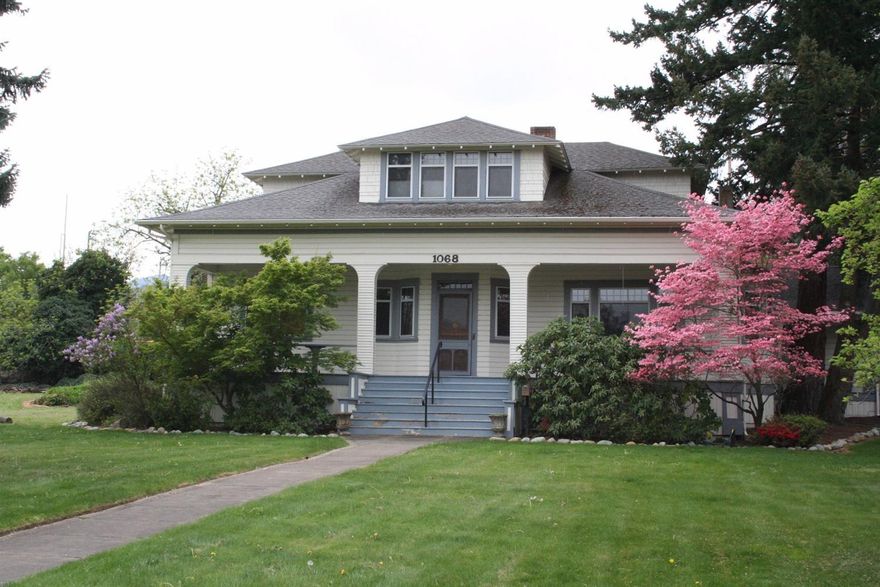 Iconic Ashland Home on Multi-Family Development Site. 1909 Craftsman-style home with original 1880's farmhouse incorporated, this 3,200+ square foot five bedroom, two bath home has been in the same family for over 100 years! Lots of original woodwork, inglenook seating, formal living and dining, two fireplaces, wood flooring, classic entry stair hall and original stairwell, separate office area downstairs, needs updating, but What a Gem! The parcel is 1.71 acres zoned R-3 (high-density multi-family) and is part of Ashland's Pedestrian Place'' overlay, which allows commercial and residential uses. There are two tax lots with soaring mature trees, good access off of two major arterials, and an ideal, central location near schools, shopping and Ashland's Historic Downtown. Truly a Once-in-a-Lifetime'' opportunity.