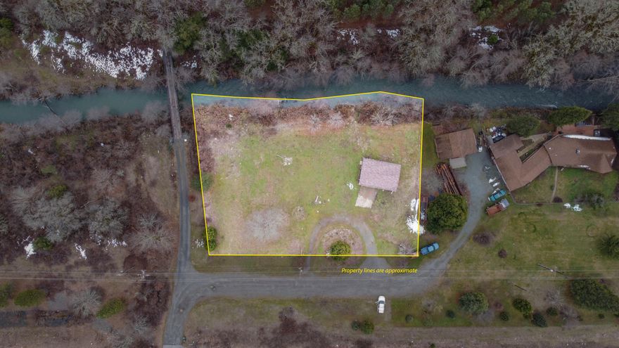 Enjoy all the beauty Southern Oregon has to offer on this level and ready to build, 0.92 acre parcel. The great creekfront parcel already has water, septic, 400 amps of power, and a beautiful year round creek flowing by. Best of all it comes with an 864 SF shop, and the seller will carry the note with acceptable terms!  The deeded water rights come with a sand filter and a UV sterilization system.  Make this property yours to enjoy, and all for under $150,000, and you're less than 15 minutes from town! Call for your tour today!