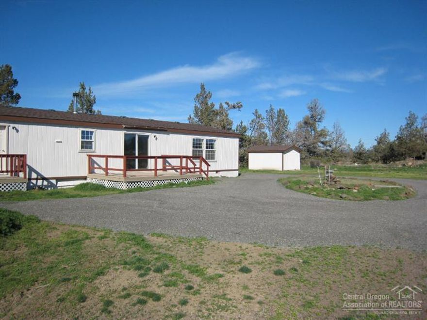 Country living at an affordable price, and convenient location only minutes from Redmond. Irrigated pasture for the critters, and lots of room to spread out. Added bonus... this property is in the line of future development.