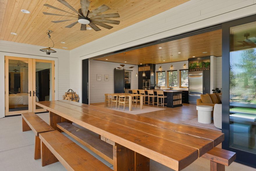 Discover your very own personal oasis in Central Oregon with this spacious and thoughtfully designed, Scandinavian modern home. Situated just off Hwy 126 and 1/2 mile from the Deschutes River you will find 7 fully fenced acres of serene landscape. This single-level home is perfectly positioned East to West for a front row seat to every high desert sunrise and sunset. The expansive, open floor plan floods the home with natural light, creating a warm and inviting atmosphere and the 25 foot sliding doors offers seamless indoor-outdoor living. Designed with both comfort and style in mind, this home features four spacious bedrooms, with two offering en suite bathrooms.  A true centerpiece for those valuing self-sufficiency, the property includes a private well, fruit tree orchard, and eight blooming garden boxes equipped with drip irrigation for easy, sustainable living. This home is a must see!