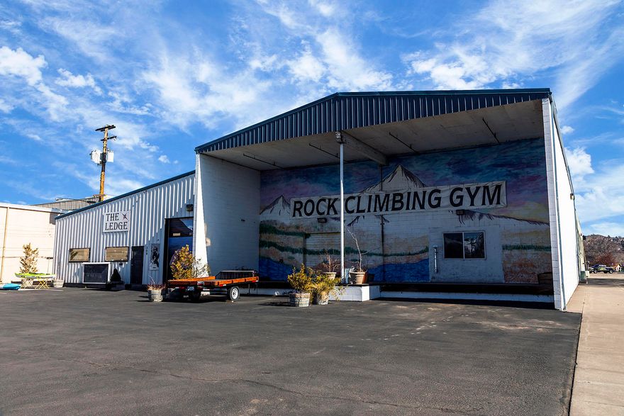 Do you have a Big Idea, but want to stay in the heart of town?  Half of a city block available for your expanding business or new start up.  Approximately 17,800sf.  Large retail or warehouse space fronting 6th St with alley access, and a easy access loading dock.  Capable of being broken down into retail units facing the busiest part of 7th St.  20kw Solar System, geothermal capabilities, and LED lighting make this a very green commercial building downtown.  24 off street parking spaces, with an additional 11 on-street parking spaces.  Call listing agent for a tour.  Please do not disturb Tenants.