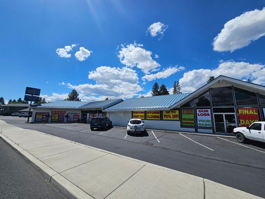 Space is occupied by current tenant through 12/31/25. Prime highway frontage retail space available January 1, 2026. This 11,764 SF building is located on S. Highway 97 with great frontage and traffic counts. Perfect for a large retailer that needs showroom space as well as storage areas in the back. Great signage and off street parking in front of the building. Fenced yard area in back. Call to schedule a tour.