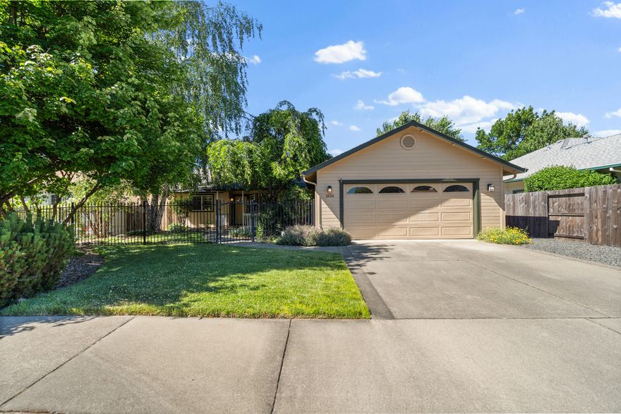 Welcome to this beautifully maintained 3-bedroom, 2-bath home nestled in the peaceful and sought-after Wagner Meadows neighborhood. This home features a desirable split floor plan providing added privacy to the spacious master suite. Enjoy a large and inviting living room with vaulted ceilings, a formal dining, and a well-appointed kitchen with tile countertops, pantry and ample cabinet space and convenient laundry room. Outside you'll find a cozy back patio with a hot tub and gazebo, and fully fenced-in yards with included sprinkler system. Located just minutes from downtown & shopping yet tucked away from city noise. Don't miss this wonderful opportunity—schedule your private showing today!
