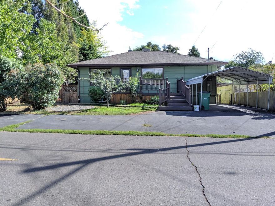This charming home has an outstanding lot, with lots of open space on the main level. The exterior and deck has been freshly painted. Upon entering the home, the traditional hardwood flooring leads you from one living area to the next, where more hardwood awaits. The plan flows nicely as the eat in nook/dining is attached to the kitchen. One bedroom is upstairs next to the bathroom with the jacuzzi tub! Downstairs has been remodeled and features 2 complete bedrooms, and an additional bonus living area. The entire downstairs will have the same new laminate wood flooring as the downstairs bonus room currently has. The back yard features a large deck and has an awesome newly revived pond with lily pads and frogs..waiting for some new pond mates to be added. There are several large above ground planter boxes for the gardener, along with plenty of room for a horse shoe pit or cornhole boards in the back. Lot is oversized because one of the past owners acquired what used to be an alley.