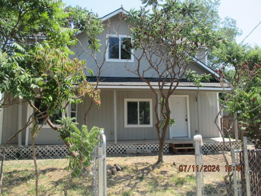 This beautifully renovated 3 bedroom, 1 bathroom home offers 1169 sq.ft. of living space. The home features a brand new roof, as well as updated flooring, kitchen, and bathroom.  The layout allows for easy flow between the living room, dining area, and kitchen. Each of the three bedrooms are spacious and bright. The bathroom has been completely remodeled with new fixtures and a modern design.  Outside, the property offers a fenced backyard. Don't miss out on the opportunity to own this turnkey home. Contact us today to schedule a showing!