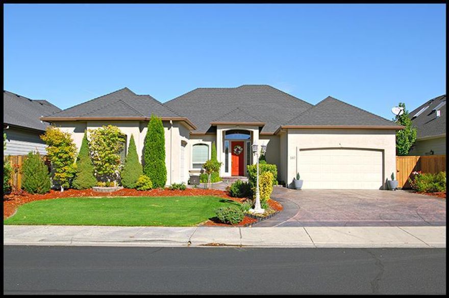 Simply impeccable care has gone into this gorgeous single level home within the Eagle Point Golf Community. Sparkling clean and move in ready, this 4 bedroom, 2 and a half bath beauty shows perfectly. The exterior is manicured to the nines. The open floor plan is evident as you walk through the front entry. Lot's of room in this home. The master is beautiful with an oversized walk in shower to die for, jetted tub of course, dual sinks, very well appointed, with huge walk in closet. Attached 2 car garage, with an addition 1 car garage or work shop. Formal dining, beautiful pillars, high ceilings. Lots of extras including invisible screen doors, up lighting and built ins, gas plumbed BBQ stays. There is a gardening shed included. Concrete walk all around the home. The kitchen is fantastic and the center of the living area, including a gas grill with downdraft, built in oven and microwave, attractive backsplash, pantry, the works! Laundry is well located and includes a deep sink. Must See