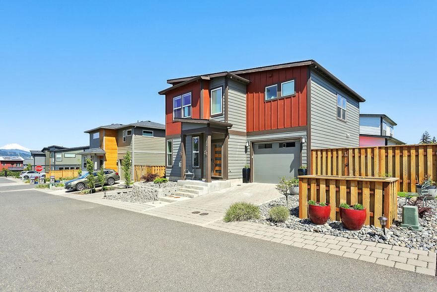 Property sits in the new community of Tanner Ranch in a newly built townhouse with minimal landscaping and fenced backyard. This home has two levels with the living space upstairs with an oversized staircase leading up. The main floor offers a gas fireplace and open kitchen concept with upgraded features including a quartz island, Quartz countertops hi-ceilings, Built-in Microwave, Convection Oven, Cooktop, Double Oven, Built-in Dishwasher, Disposal, Free-Standing Refrigerator, Gas Appliances, Pantry, washer and dryer included and more. The floors throughout are (LPV) luxury vinyl planking & carpet in the bedrooms with a powder room or half bath on the main floor with an entry to your private backyard patio setting. From upstairs, you do have a view of Mount Adams. Property could be used as an income producing property for AirBNB, VRBO, STR or more.