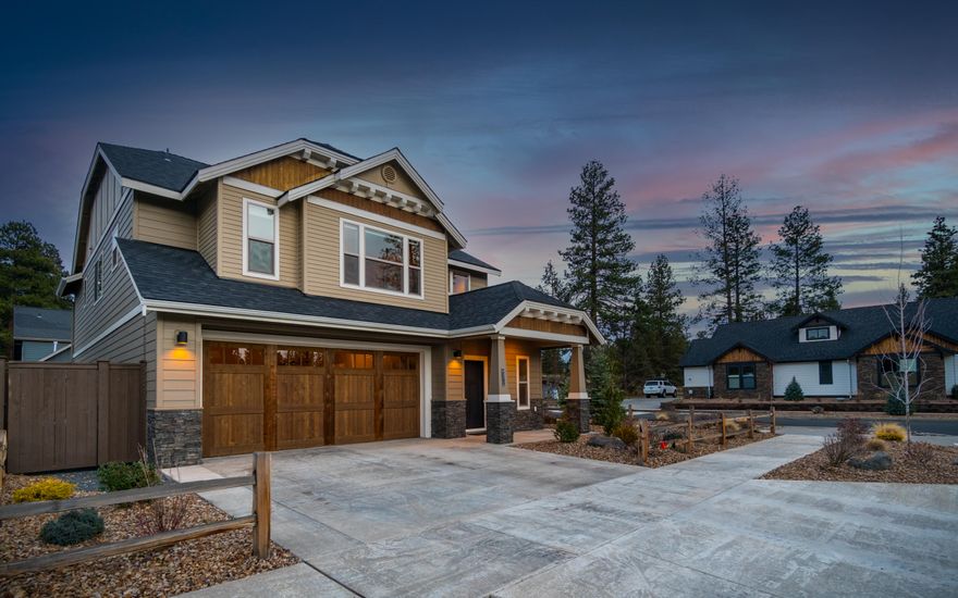 Like new! Stunning and spacious former model home with all the upgrades in beautiful Rimrock Riders neighborhood! From the covered front porch to the gorgeous two-story grand entryway you will fall in love with open spaces, high ceilings and generous living areas, creating the perfect place to call home. The open great room features a stone surround fireplace, huge gourmet kitchen with island, quartz counters, large pantry, stainless appliances and a dining area with door to the backyard. Easy to entertain and spend time outdoors with the covered back patio and fenced, landscaped yard! Upstairs loft landing leads to oversized primary suite with coffered ceilings and space to create an office, exercise or sitting area. Two more large guest rooms with walk in closets, modern guest bathroom and beautifully finished laundry with sink complete the upstairs. Steps from Riley Ranch trails, schools, the river and quick easy access to all the shopping, eateries and fun that Bend has to offer!