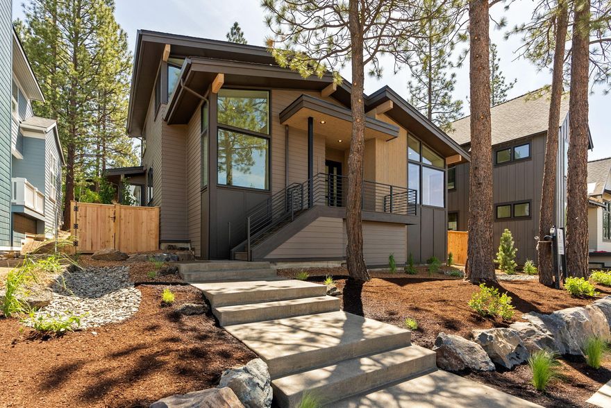 A stunning mid-century modern gem, this newly built home in Bend's Talline neighborhood has been meticulously crafted by Structure Development to meet their exacting standards of quality and design. Vaulted ceilings flood the home with natural light and offer gorgeous Cascade views from the open floor plan, maximizing winter sunlight with a west-facing orientation. The primary bedroom with en suite bathroom and den are on the main level, while two bedrooms share a full bathroom on the upper level. Earth Advantage certified, this home blends energy efficient building practices with Structure's signature style including high-end Fisher & Paykel appliances, curated light fixtures, and unique stone counters throughout the interior. A fenced backyard with covered deck allows for seamless outdoor living and entertaining when at home, and the unbeatable NW Bend location is within easy reach of Shevlin Park, Phil's Trail, schools, shopping & all of NW Crossing's amenities when venturing out.