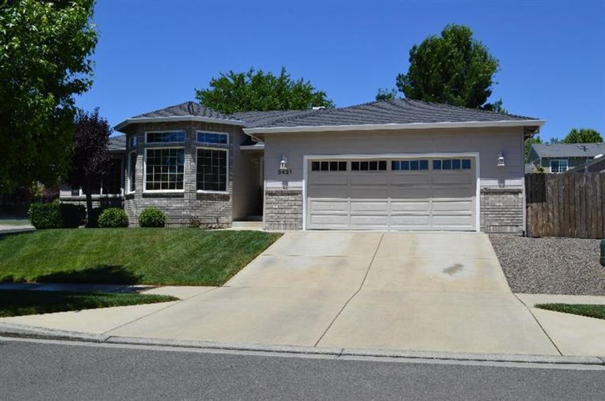 Stunning and meticulously cared for home located on a large corner lot in beautiful East Medford! This home has amazing curb appeal. You are greeted by the lush lawns and gorgeous landscaping that the sellers have created. The 2096 sq ft home features a large entry, living room with a beautiful French door and lots of windows for natural light, a family room with gas burning fireplace with mantel and hearth. The great room is open to the kitchen and dining area with a slider to the back patio. The kitchen is light and bright with plenty of cabinets, a lot of counter space, and includes updated cabinet hardware. The bedrooms are all nice size with the master bedroom having coffered ceilings, a huge master bath, and large walk-in closet. Both the backyard & front yard incl. trees for shade, lush lawn and in-ground sprinklers The side yard could be used for a small RV like a boat, or utility trailer. Minutes to shopping, hospitals, and wineries! This home is a must see!