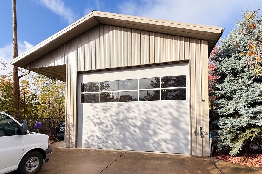 PRICE REDUCED!. Rare opportunity to live & work in the same location with this 2516sf commercial building with 504sf second story office mezzanine built in 2011 with so many extras need to see for yourself. 20ft wide entrance door in front, 8ft side door along with 22ft ceilings, heat & ac, large exhaust fan. Owner spared no expense. Lots of possibilities for its use. Then step out of the shop area into this beautifully restored 1956sf 3bdrm/2bath home with attached garage. Home has had many upgrades, including newer roof, windows, plumbing, well & well components, newer exterior paint also restored oak flooring throughout the home. The shop & home sits on .68 acres with gorgeous landscaping, lots of trees, shrubs & fruit trees. Property also has a tool shed, greenhouse/hobby room &  RV parking/ hookup with a completely fenced backyard. All potential buyers must be prequalified before showing. Shown by appointment only. Owner may consider partial carry with large down.