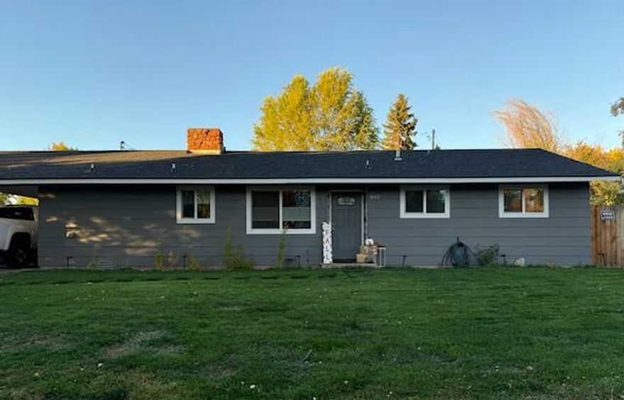 Charming Retreat on a picturesque tree-lined street. Both warmth and character welcome you into this updated home, nestled on a spacious ½ acre lot. Vaulted wood ceilings and a large stone wood burning fireplace create a cozy focal point in the living room. The owners have refurbished the home with stylish LVP flooring, paint, tile work, and sinks. Large laundry room could easily become an office or an extra bedroom. Large fenced backyard. Carport with shed on one side of the house, and extra parking for two morecars on the other side.